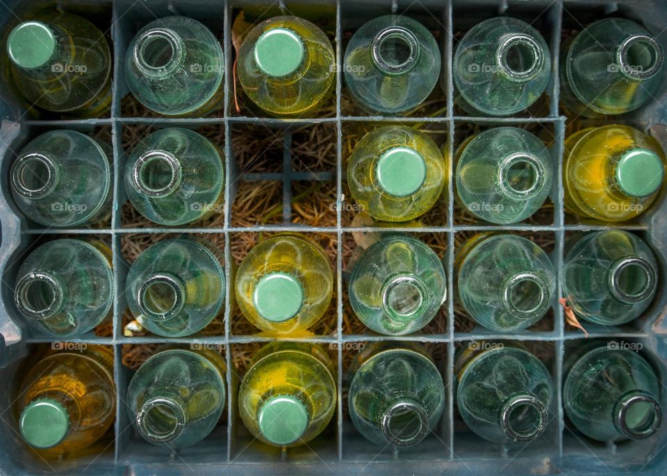 Crate with bottles, flat lay