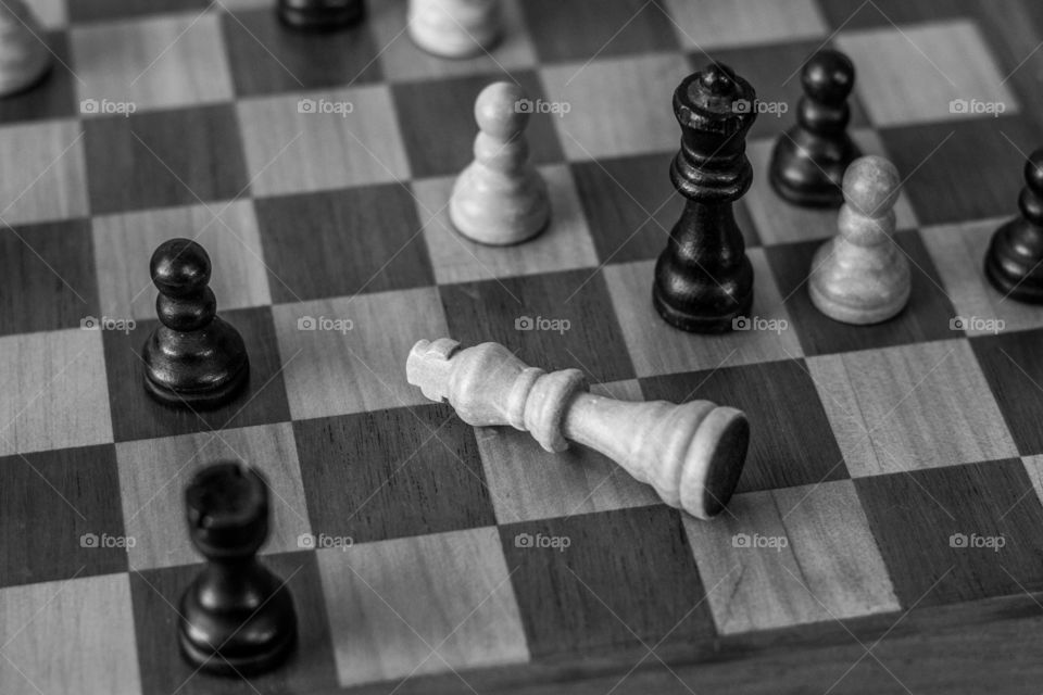 Picture of the most strategic board game, chess. It is a still life shot about a chess mate.