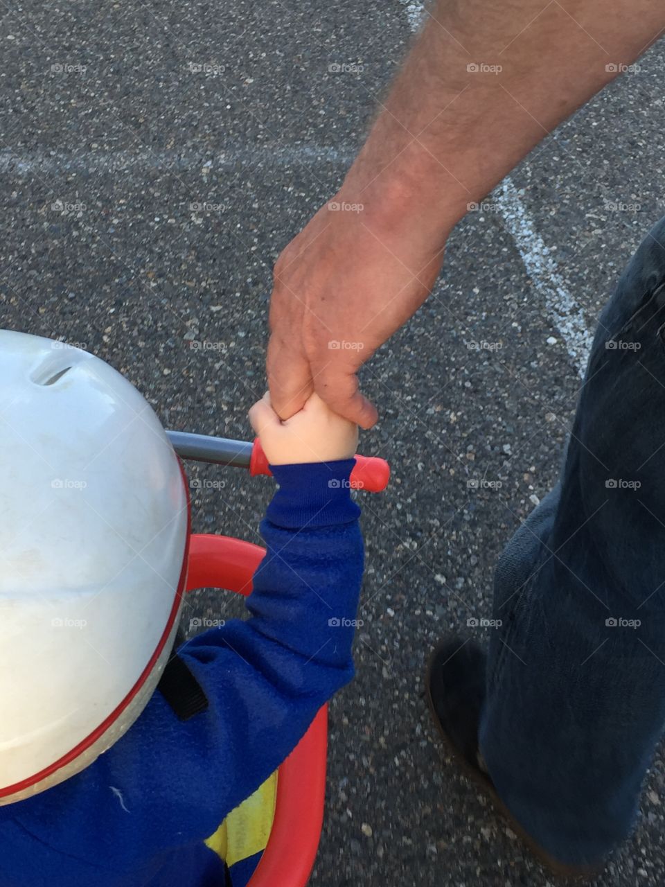 Our grandson loves to hold hands when outside weather he's in his stroller, on his bike or walking along. 