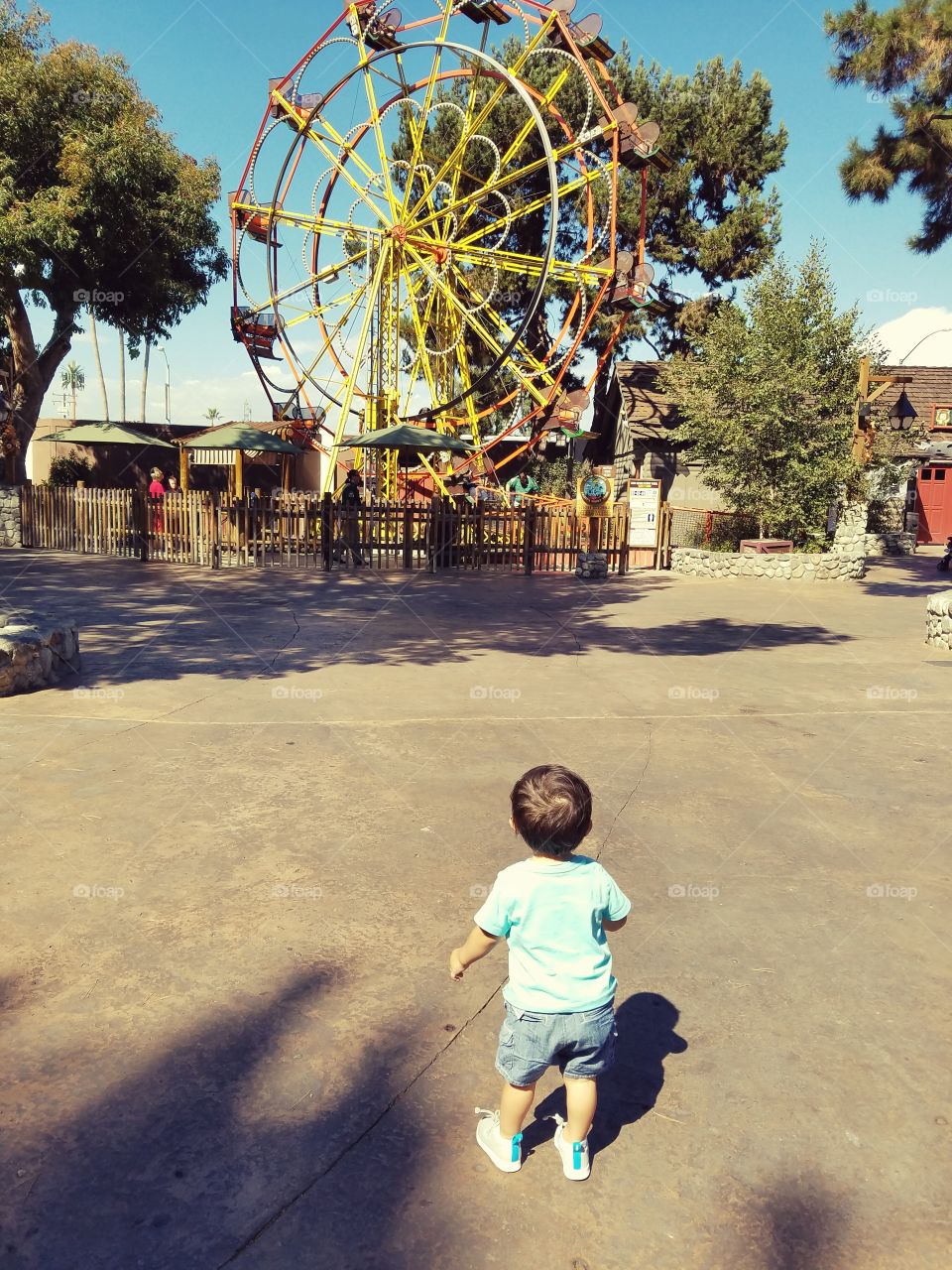 running to ferris wheel