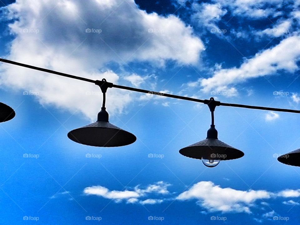 Hanging lights over a cafe in Corsica