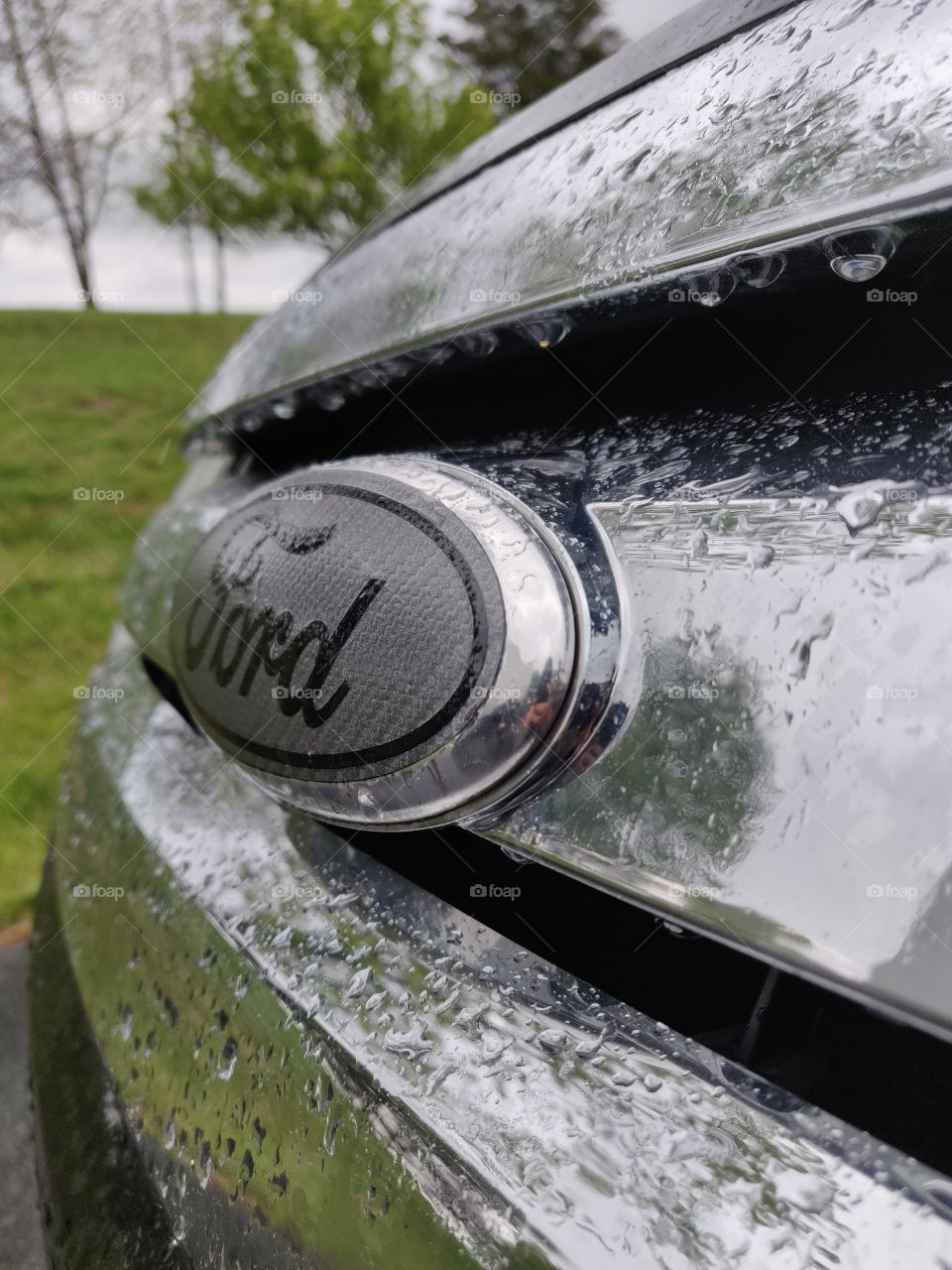 Ford in the rain.