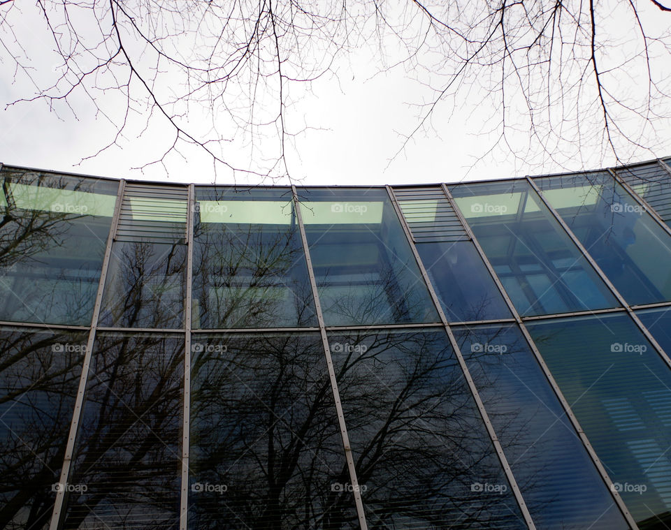 Low angle view of building against sky by day.