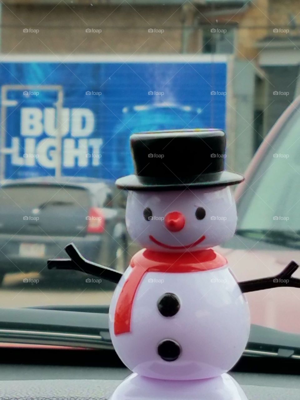 Another day with frosty on our dash. The view sitting in the grocery store parking lot.