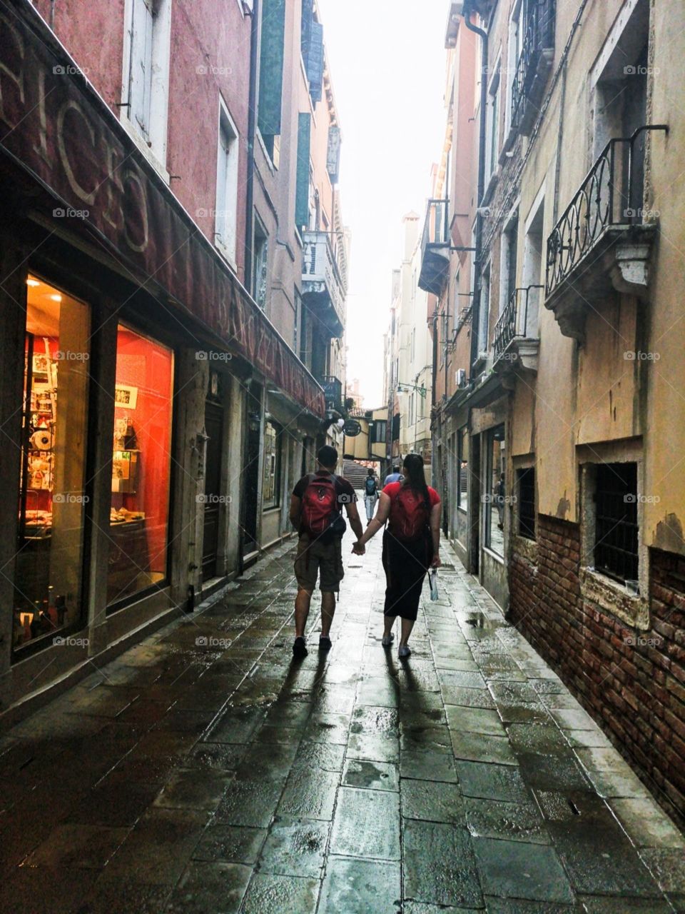 lovers' early morning walk in Venice
