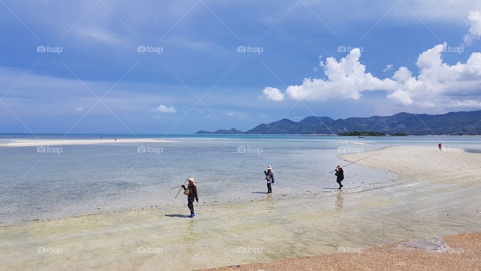 fishermen on the beach