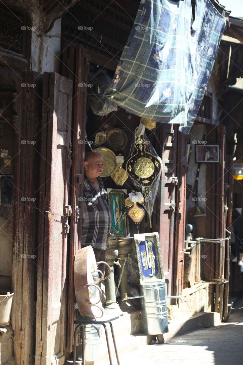 Man standing in antique shop