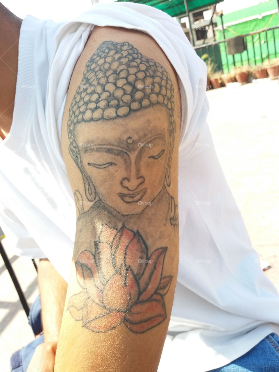Buddha tattoo.