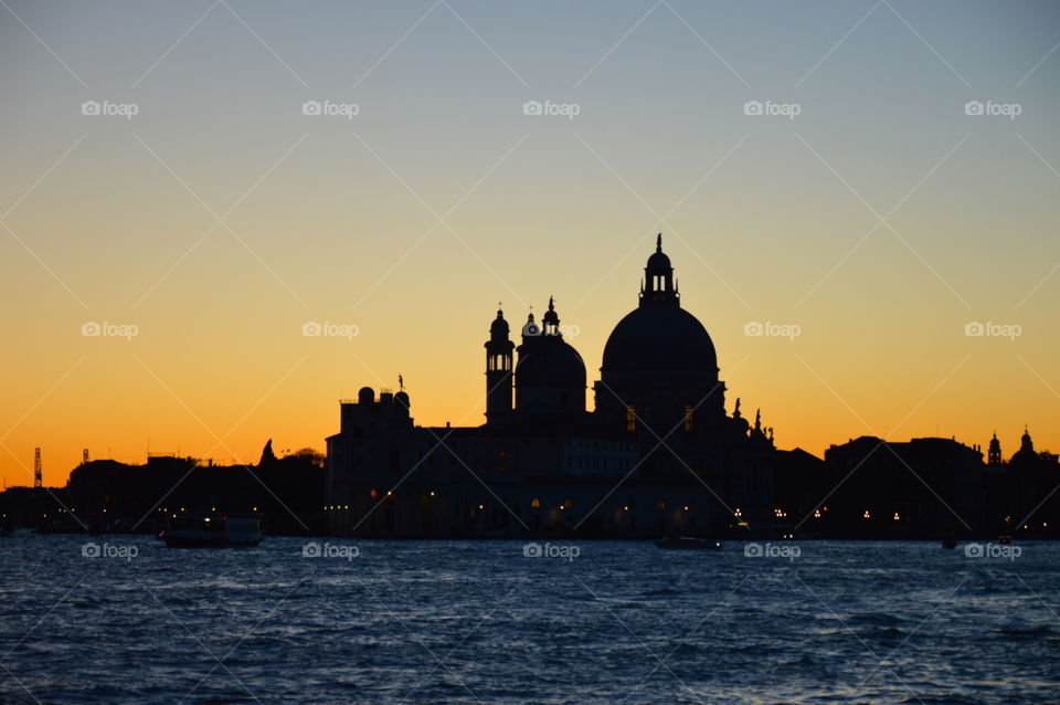 Silhouette of Venice at sunset in summer