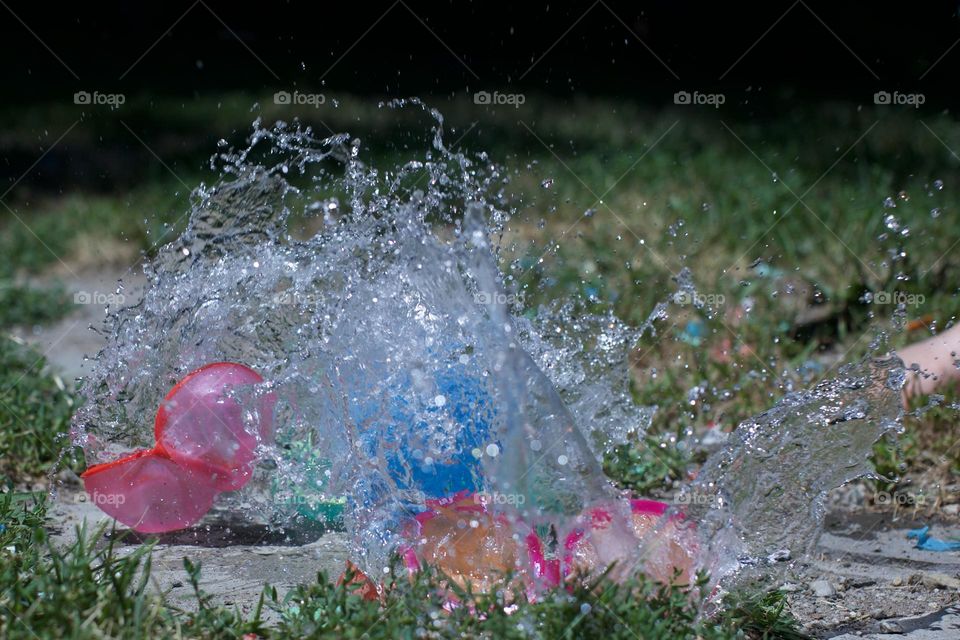 Water balloon fun in a summer day 