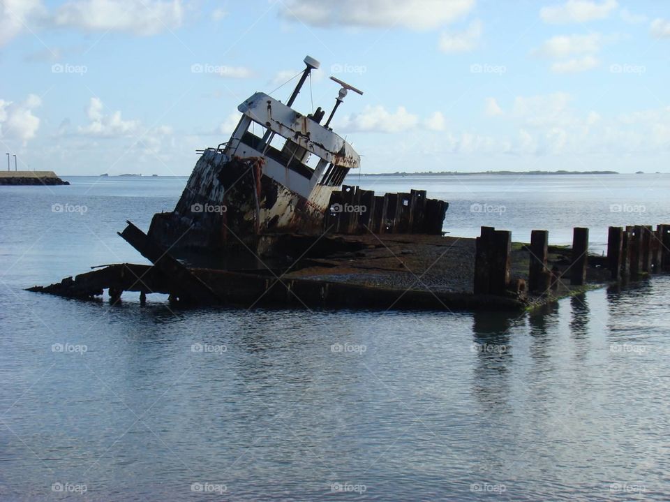 Abandoned. Abandoned ship off the coast of Puerto Rico...victim of a hurricane 