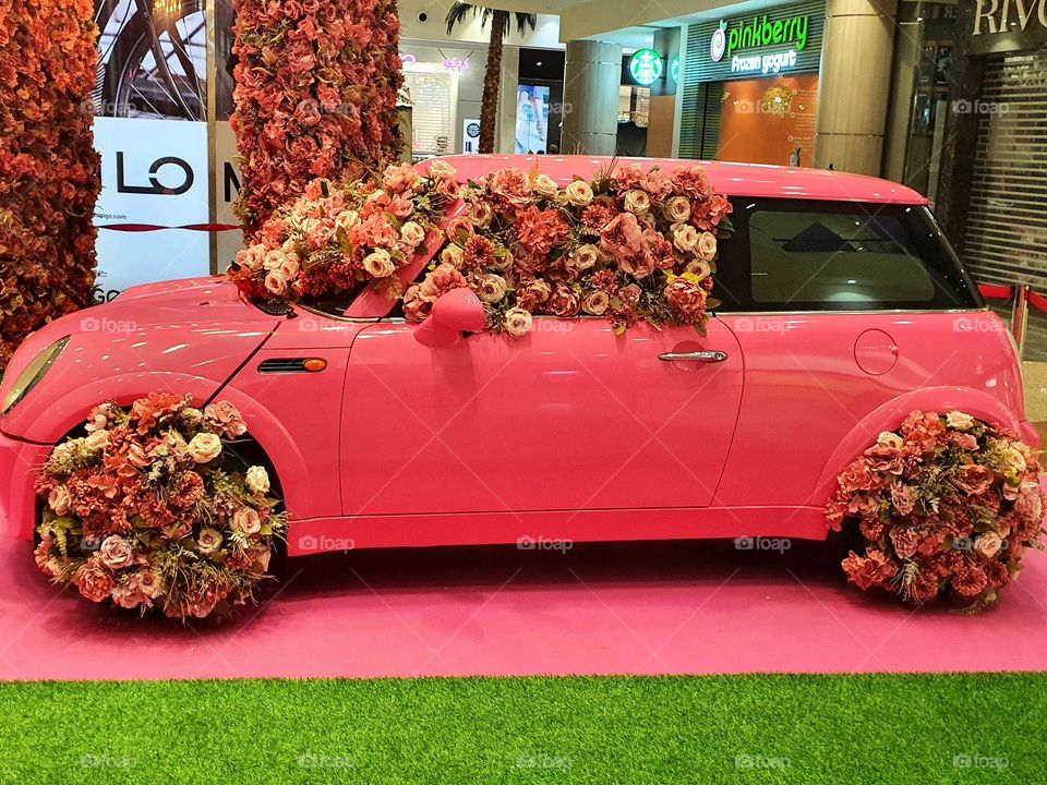pink car full of flowers
