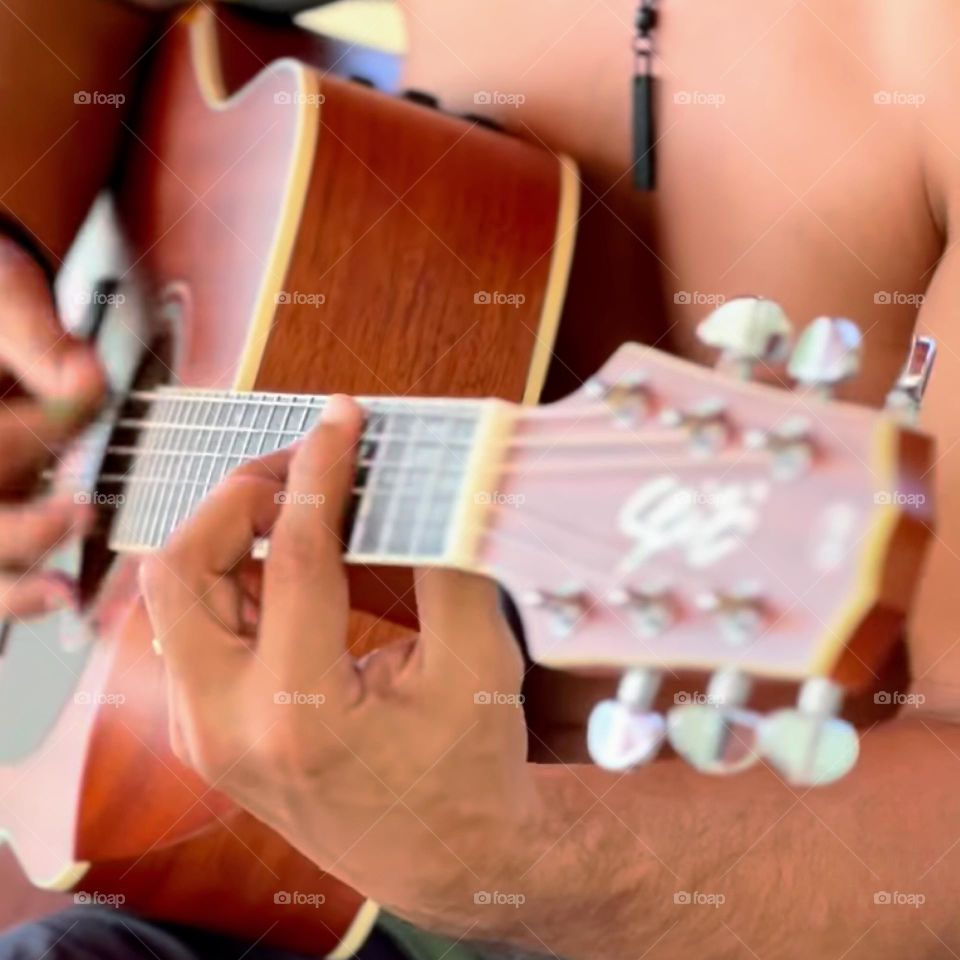 man playing guitar