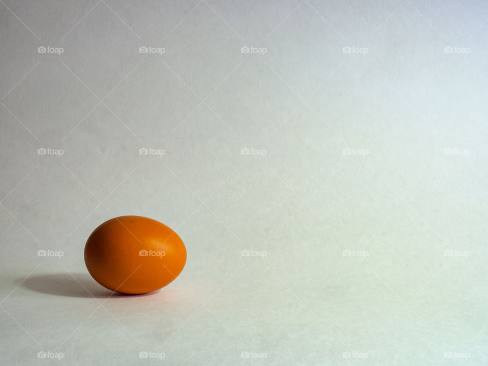 Eggs of brown color not decorated prepare for the holiday Paskh on a light white background.