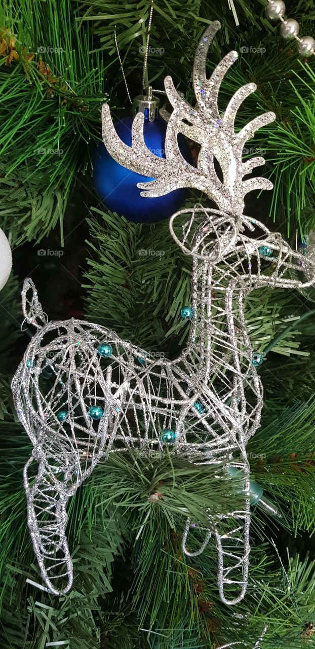Decoration rain deer on our christmas tree beads and wire for an effective look.