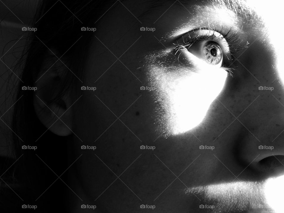 Black and white closeup portrait of woman