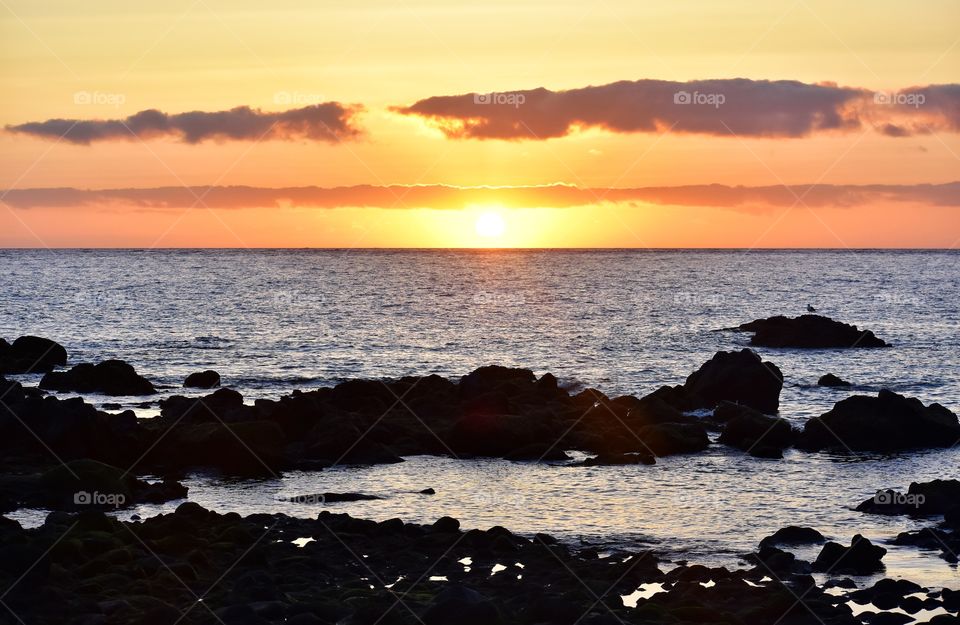 sunset over the atlantic ocean coast on la gomera canary island in Spain
