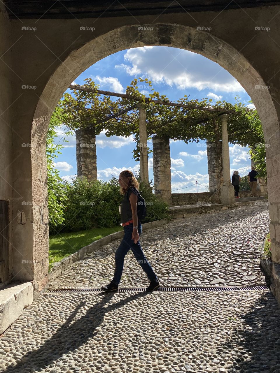 Walking by, Rocca di Angera, Italy.