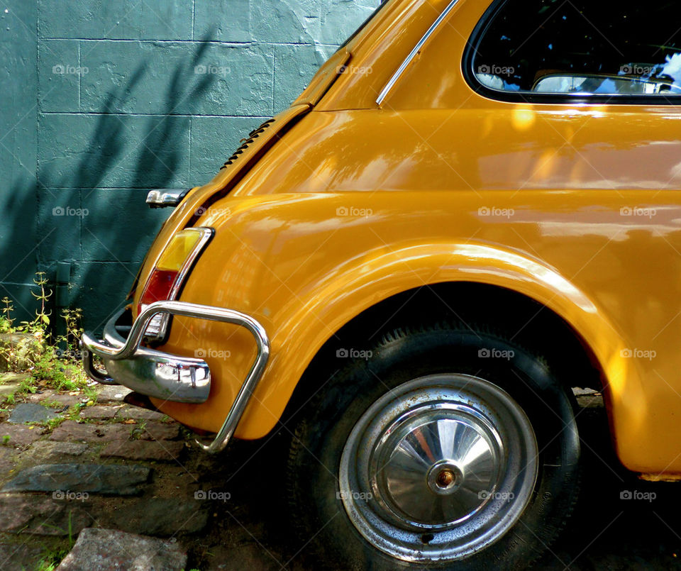 THE LITTLE FIAT AT THE PARKINGLOT