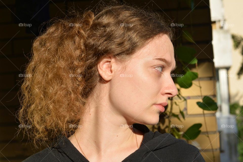 young girl beautiful portrait in sunlight