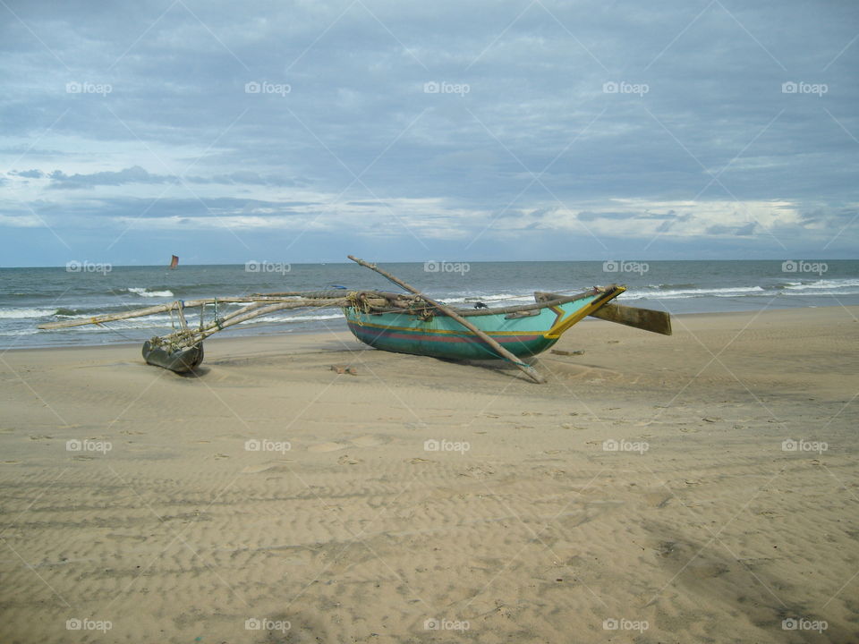 Fishing catamaran on ocena shore