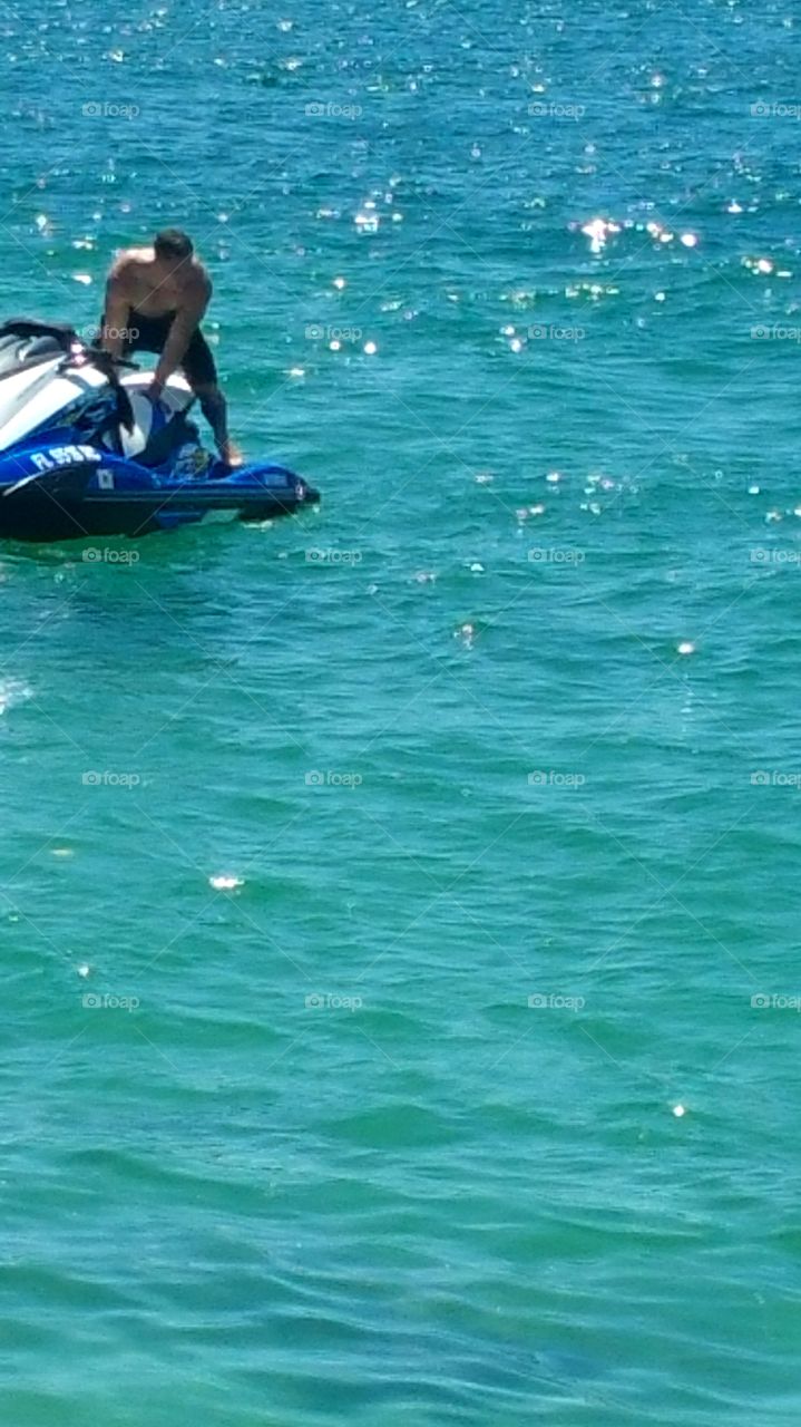 Hot Guy Alert... I can't resist 😉having problems with his jet ski South Beach Miami