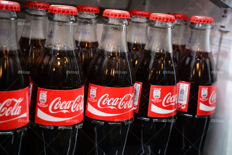 glass bottles of famous coca-cola drink