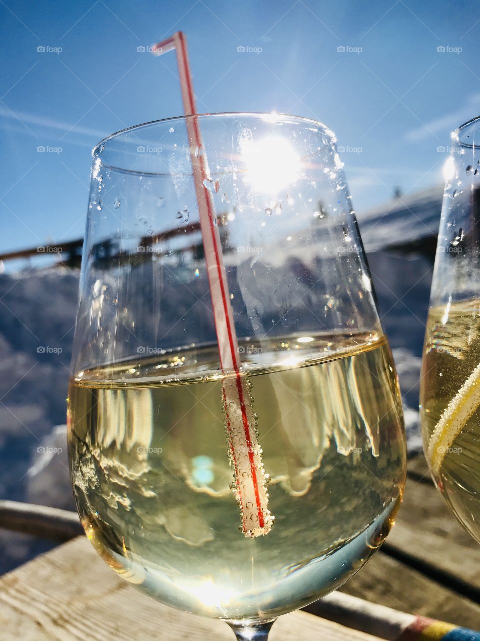 Have a nice Glas of wine after skiing on top of a mountain - cheers!