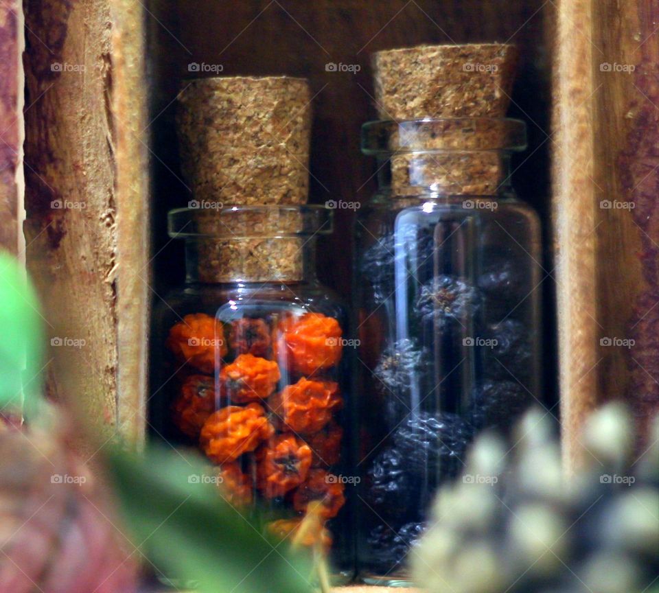 bottles with dry berries