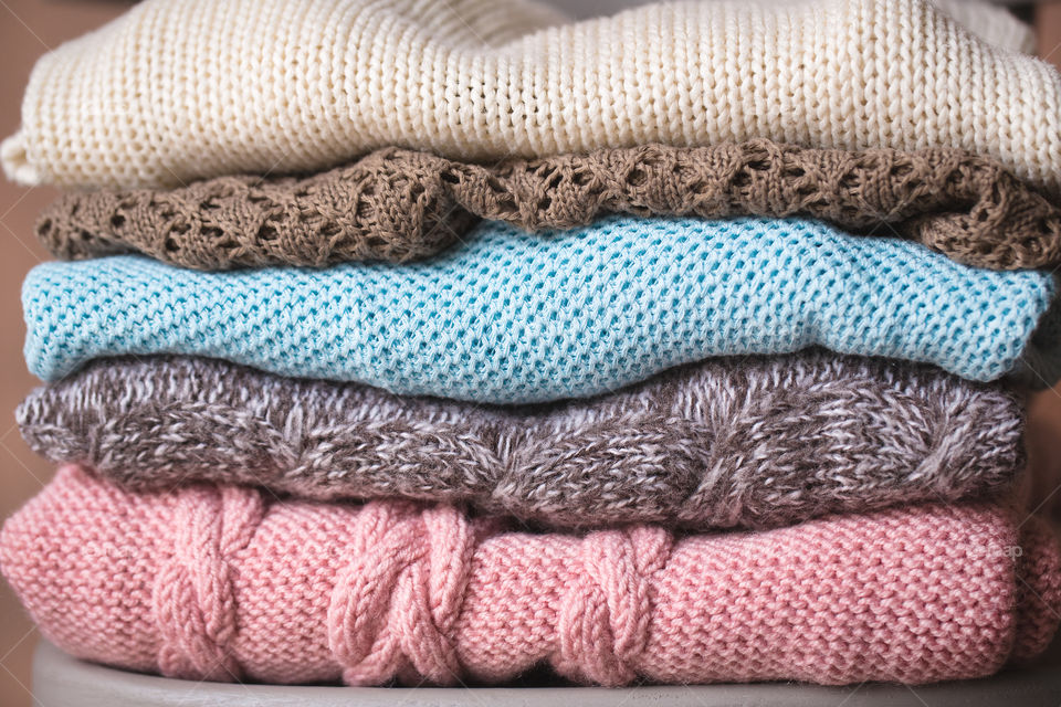 Stack of warm sweaters