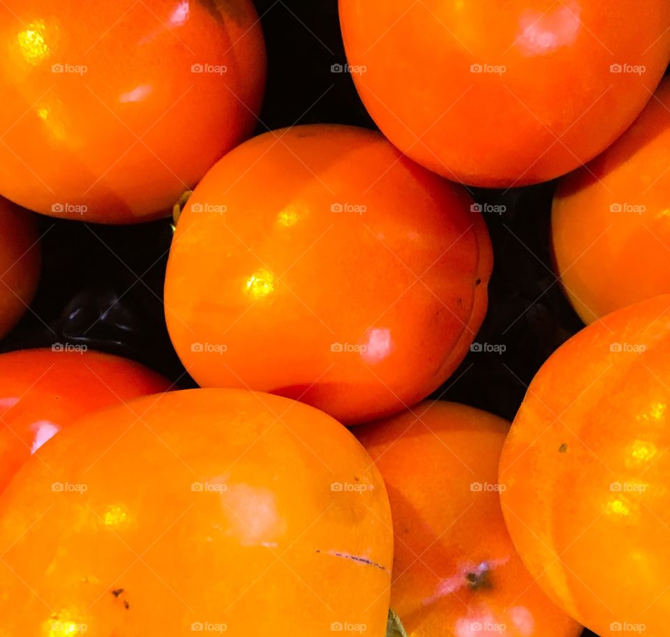 A pile of sweet persimmons