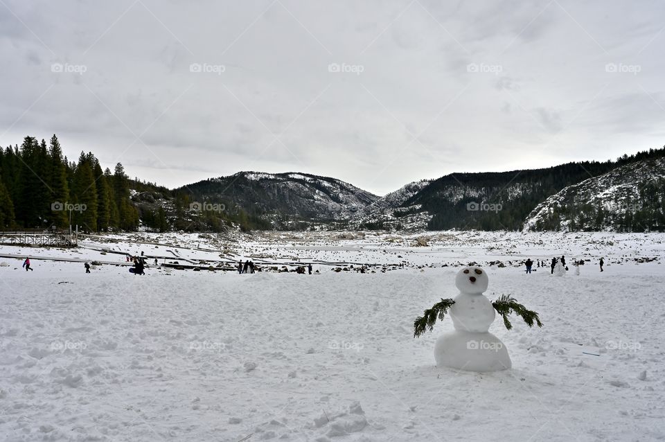 Mr. Snow man was on guard at Pinecrest lake during the new year celebration in winter. 