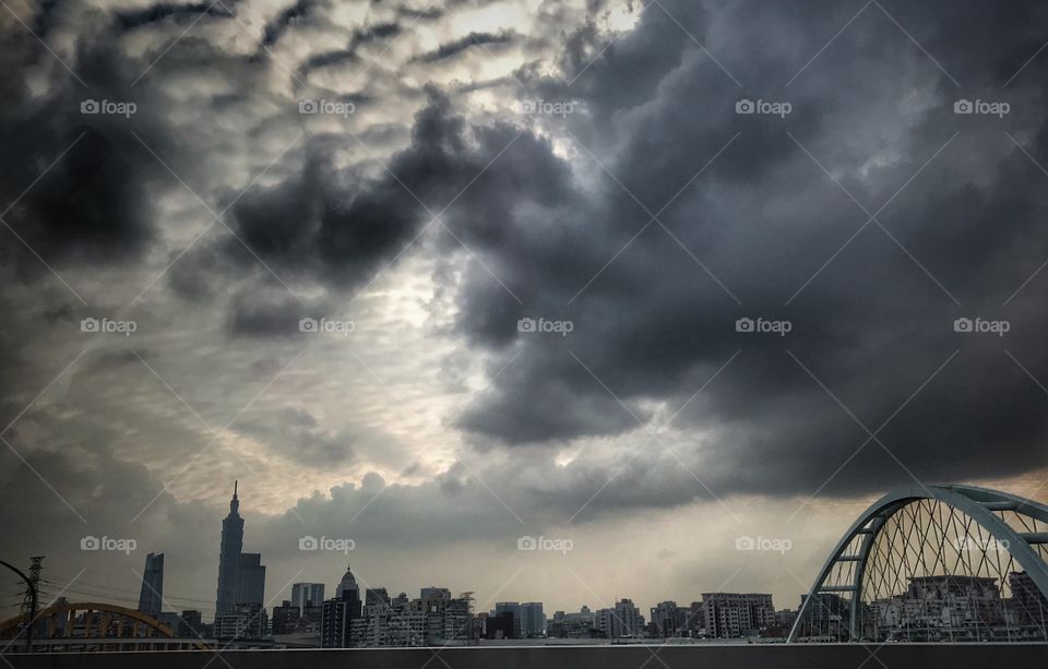 Cloudy skies over Taipei - the Taipei skyline reflecting in the clouds .... very interesting to say the least 