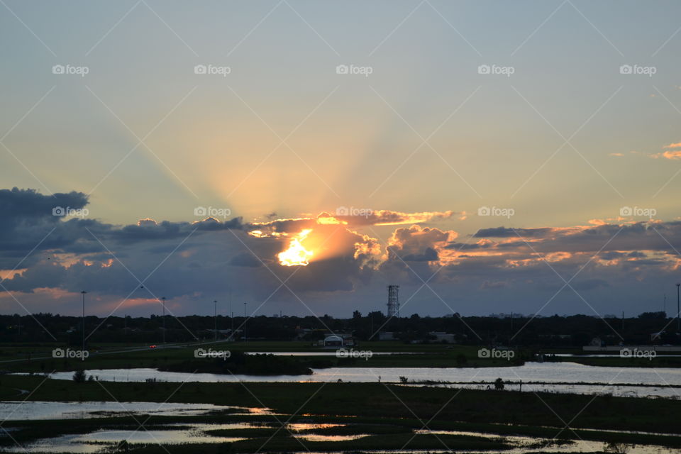 Sun Rays as Seen From Atop the Hill at the Celery Fields over Sarasota, Florida