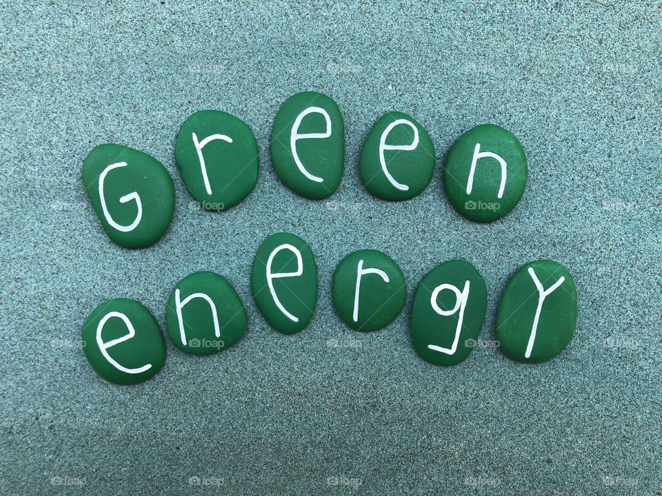 Green energy text with green colored stones