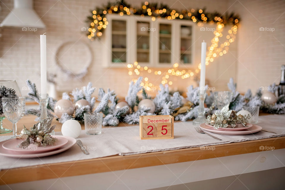 Christmas background with wooden block calendar with the date of December 25