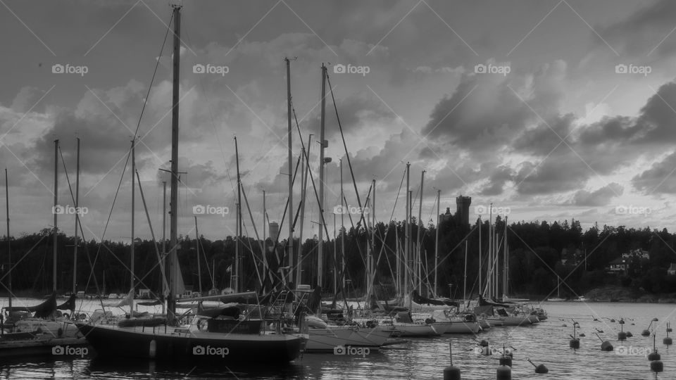 Dark Clouds and Silent Boats.