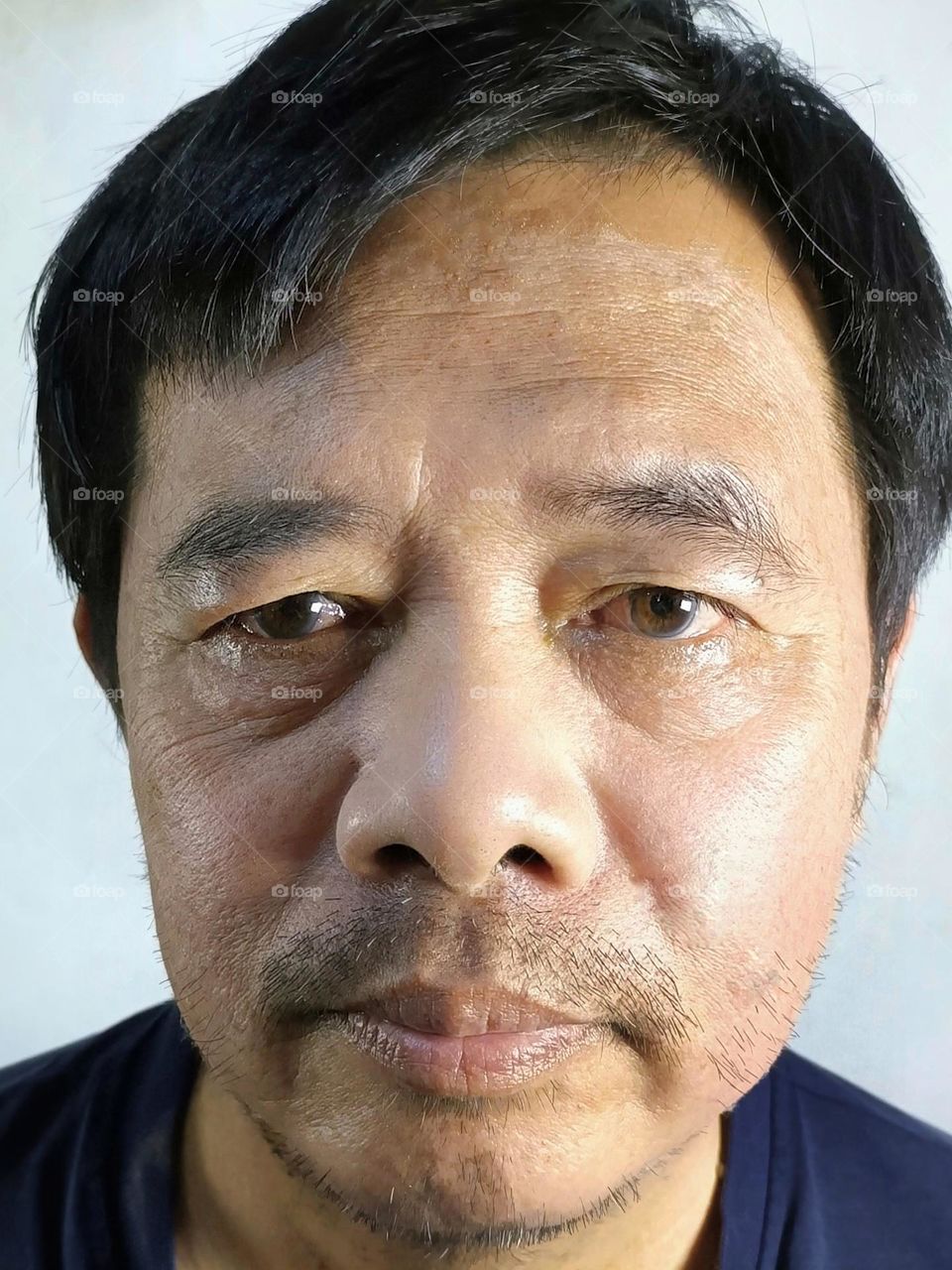 A Chinese man get start to grow his mustaches.