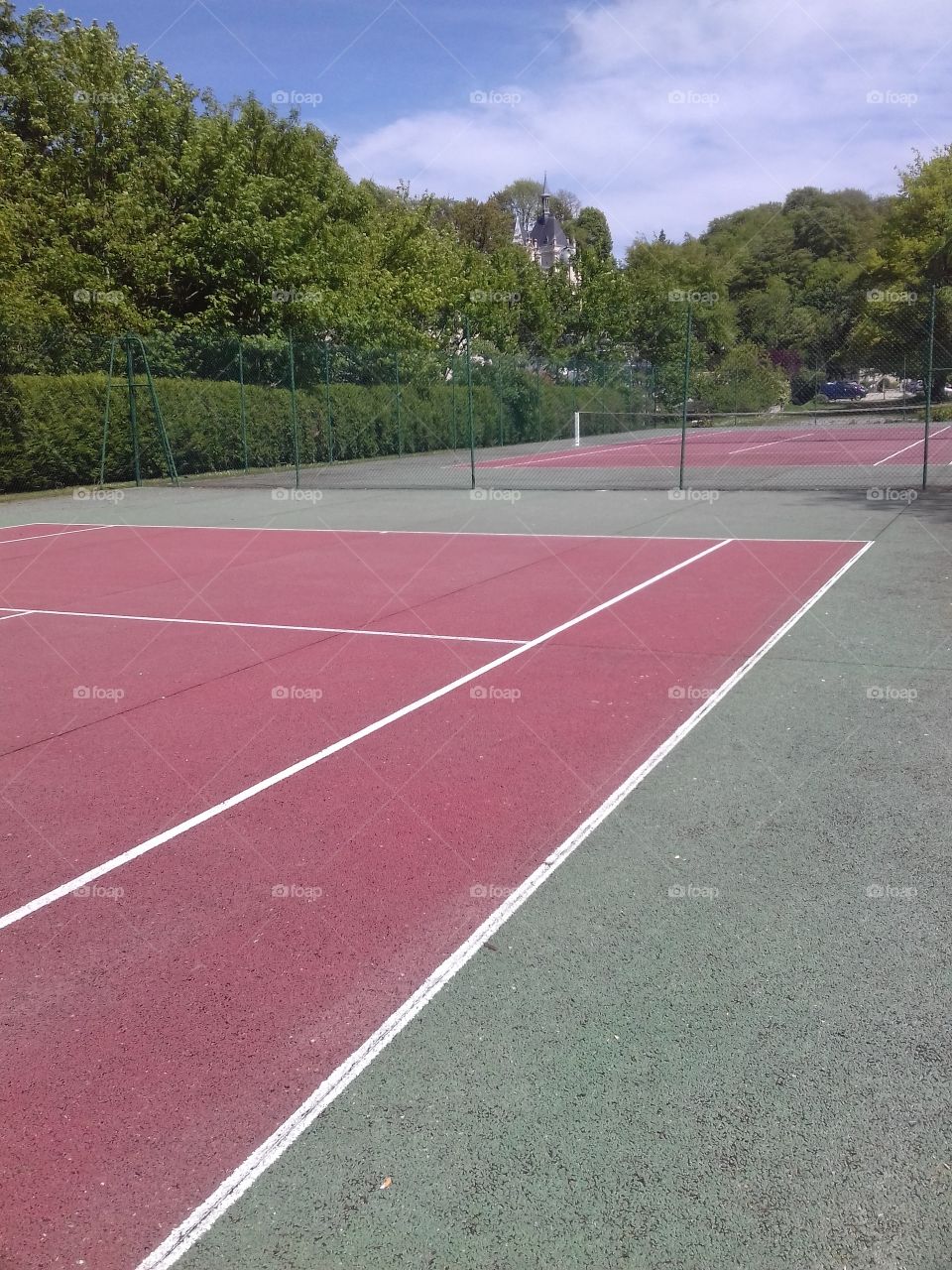 tennis court under the sun