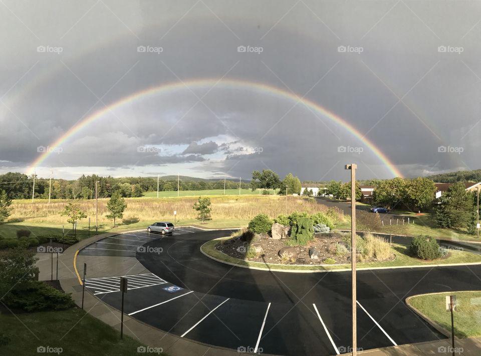 Double rainbow seen from office building