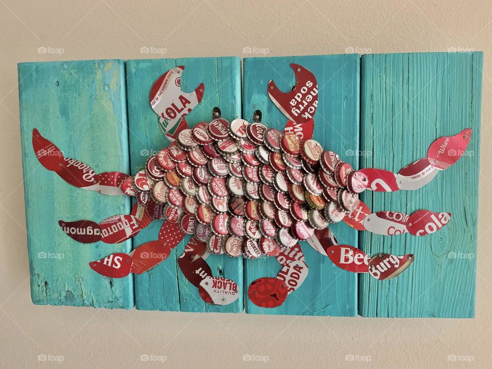 Crab made with round bottle caps - Geometry is a type of math that deals with points, lines, shapes, and surfaces.
Examples are Circles, Rectangles, and Triangles. A circle is a round-shaped figure that has no corners or edges