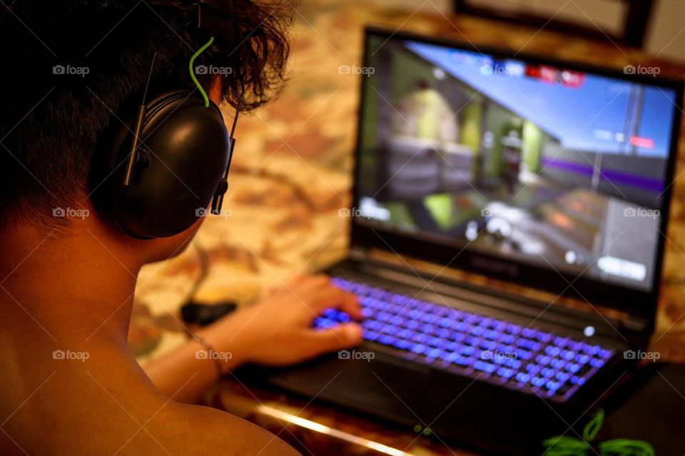 Young man is playing video games