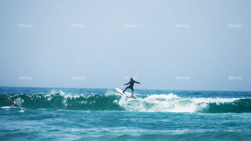 surfing man