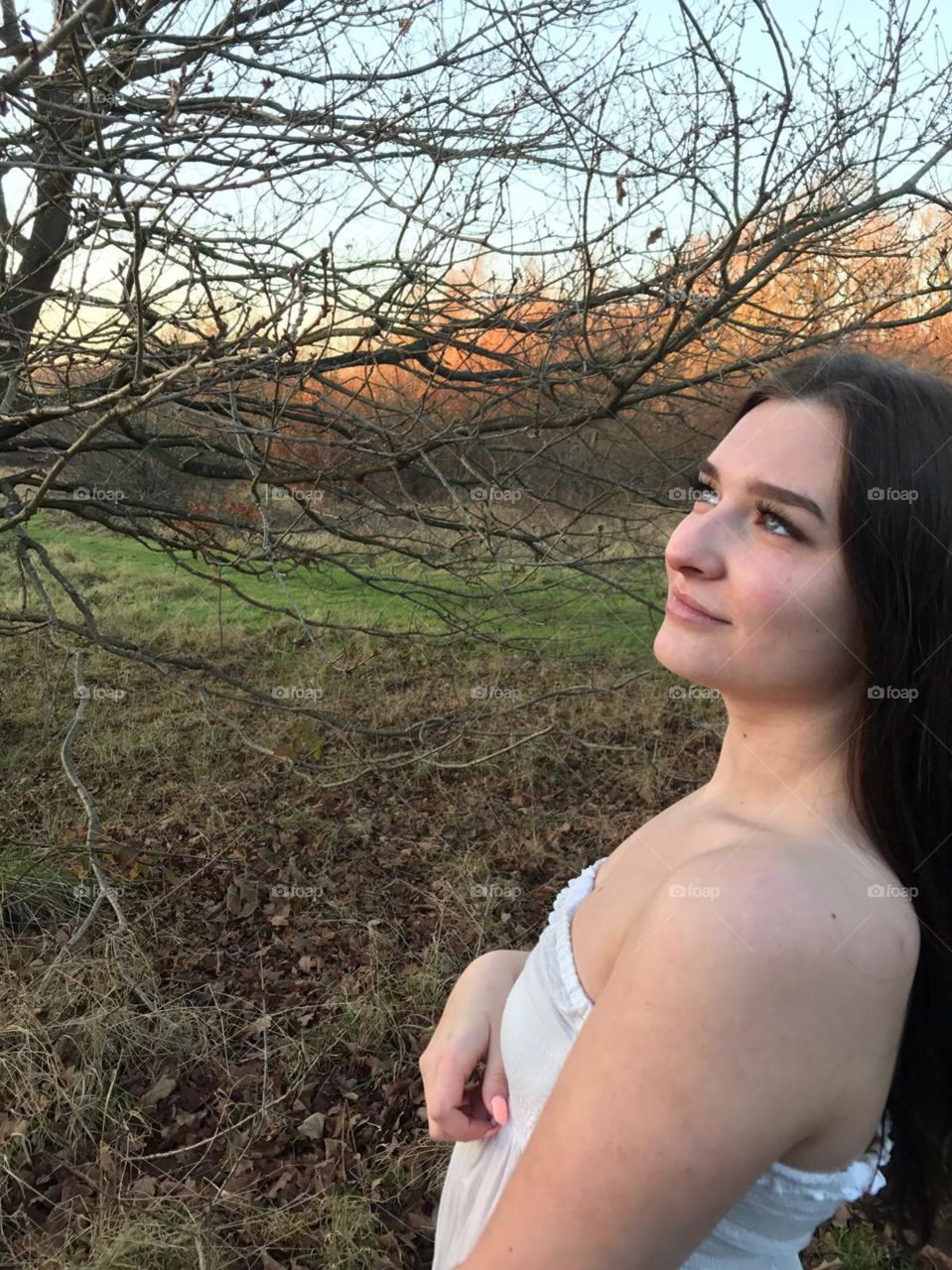 Girl gazing in the woods 