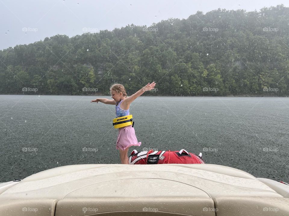 Enjoying the summer rain by dancing