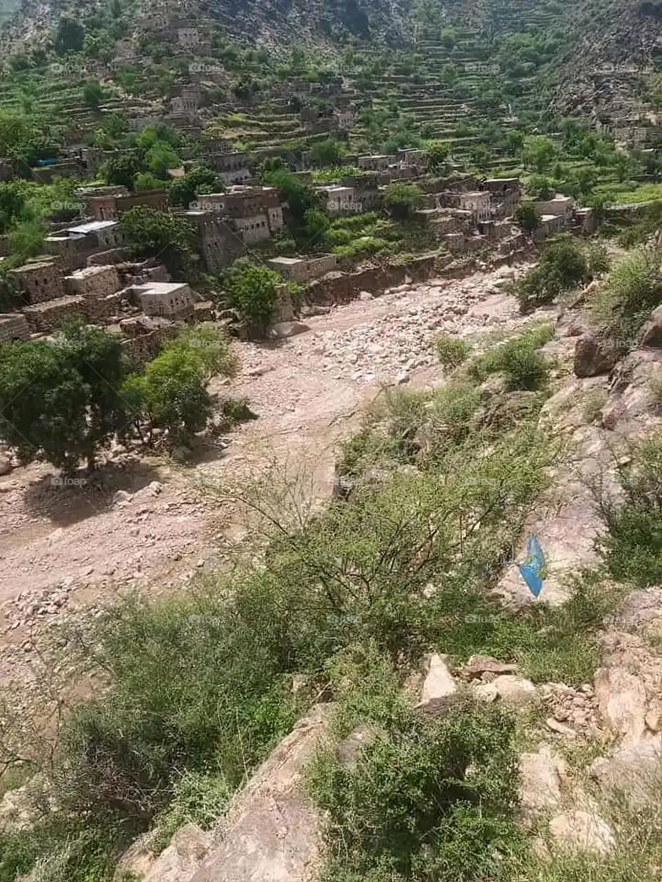 Glory be to God, the magnificent and picturesque view and the natural green trees are a view that is nothing more wonderful than it