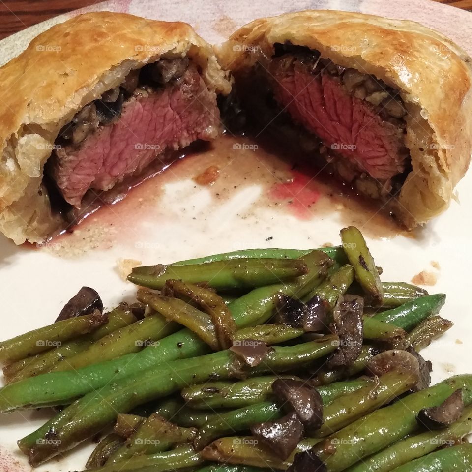Beef Wellington with sauteed green beans