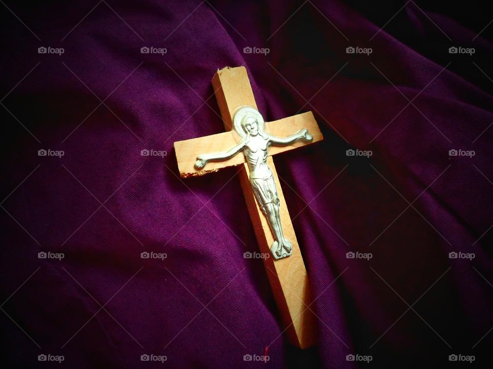 orthodox cross on purple background