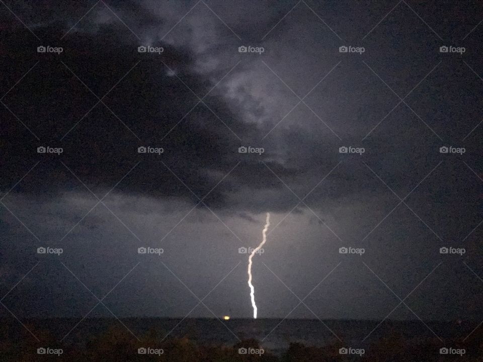 Lightning storm rolling in off the Indian river Titusville Florida