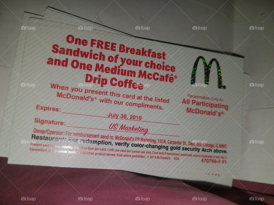I entered a Twitter Giveaway and won 4 of these same coupons for McDonald's breakfast. :)